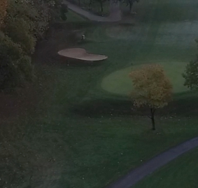 A green and bunker at York Golf Club in autumn